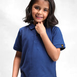 Kid wearing the navy classic polo