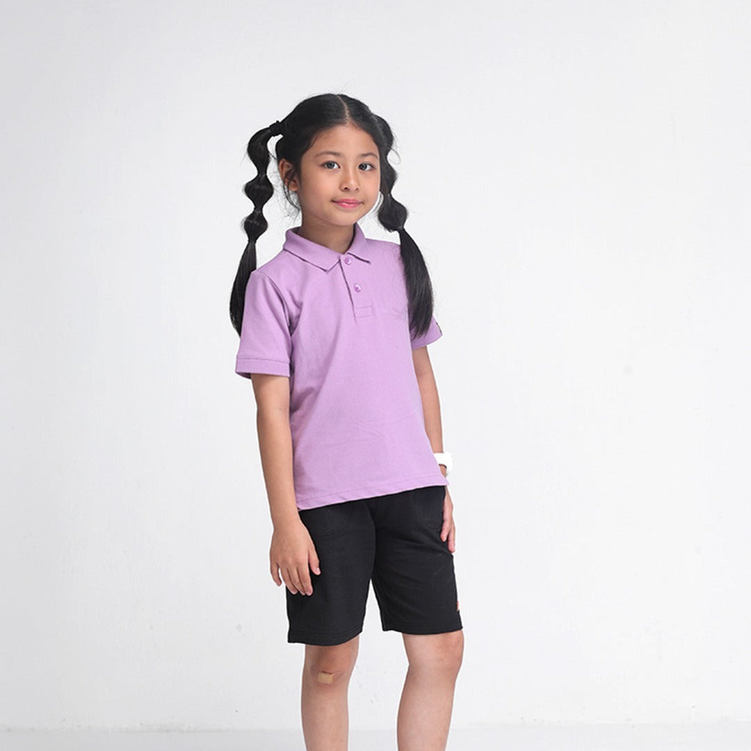 Kid wearing the lavender classic polo